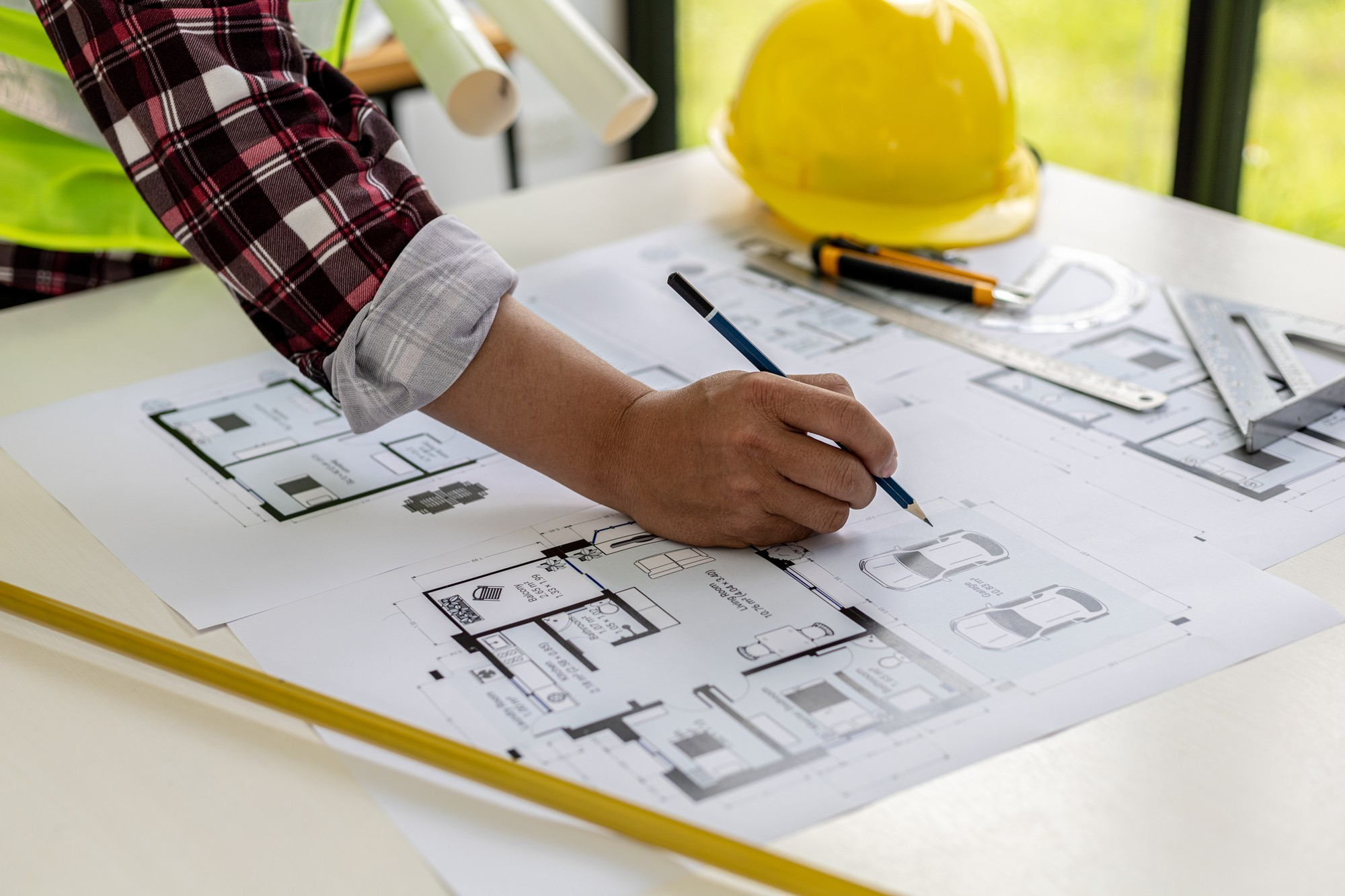 Construction plans being reviewed in the field
